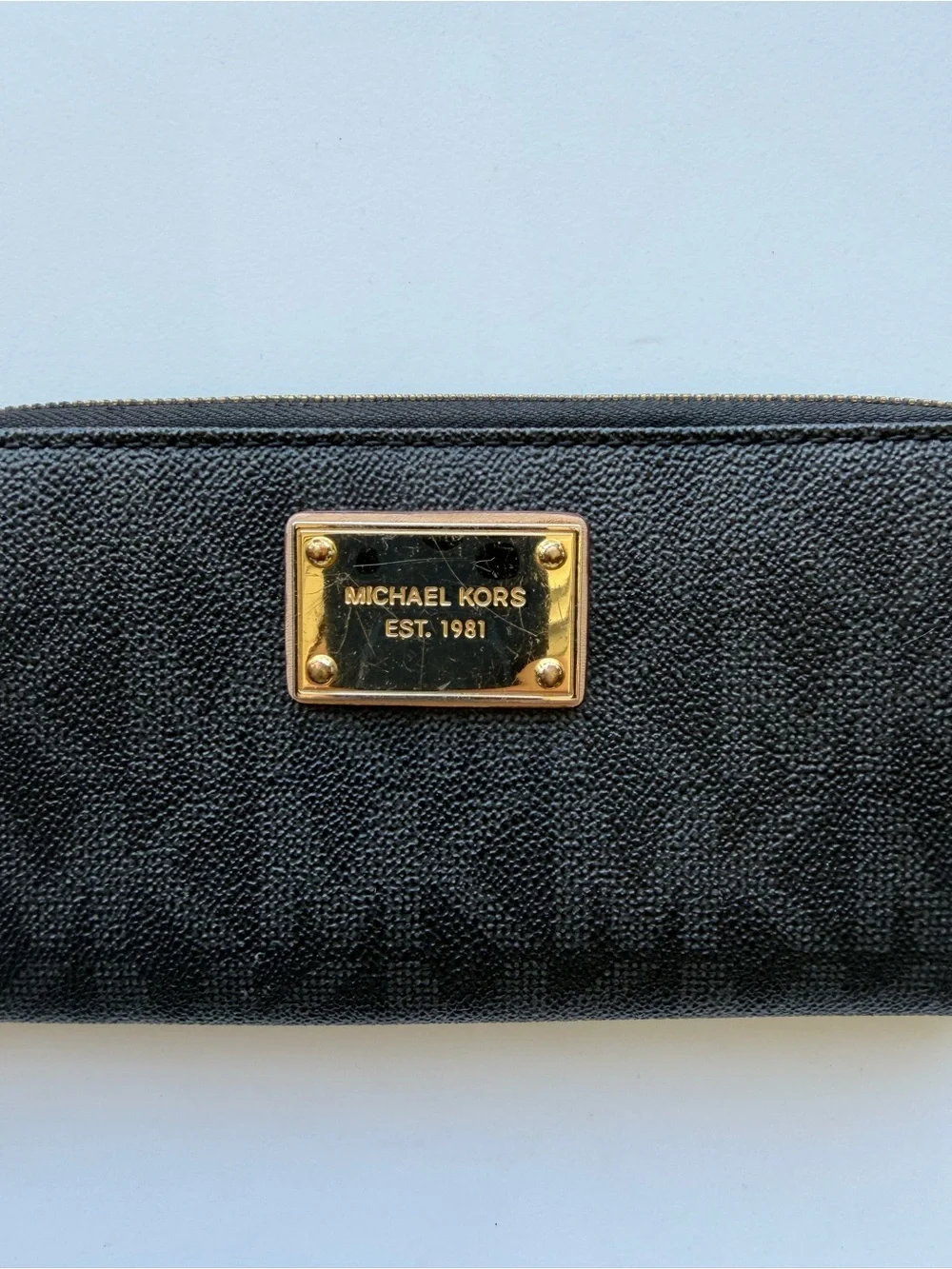 Michael Kors Black Zip Wallet with Gold Plate